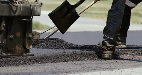 4K asphalt shoveling Stock Footage 112031765