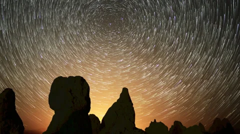 4K Astrophotography Time Lapse of Star Trails over Pinnacles -Pan Right- Stock Footage