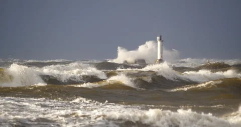 4K - Atlantic storm. Huge waves crash into lighthouse Stock-Footage 142651732