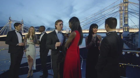 4K Attractive diverse group socializing at boat party on the River Thames Stock-Footage 47682557
