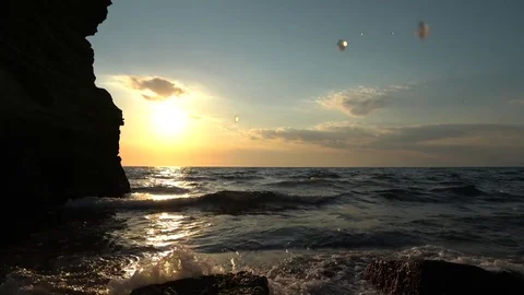 4k Awesome sunset with waves crashing in rocks in Procida Island Stock Footage 78029411