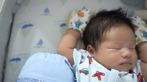 4k b-roll cinematic portrait footage of a newborn baby. Stock Footage