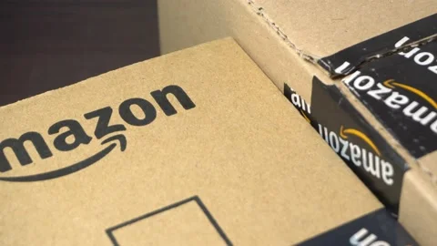 4K B Roll Clips of Amazon Prime parcels wooden background Stock Footage 155783456