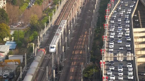 4K B-roll Footage of High Speed Train, Green Train, Road Vehicles and Transp Stock Footage 338000199