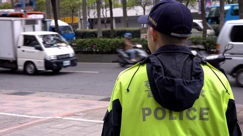 4K, back of policeman officer's jacket with the word police. Patrolling city-Dan Stock Footage 91800867