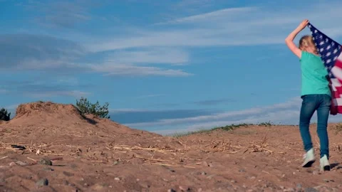 4k. Back view girl walking and waving na... | Stock Video | Pond5
