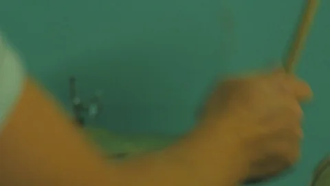 4k Back view of handsome man plays the drums Stock Footage 83886218