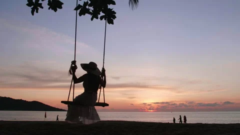 4K Back view of silhouette young women enjoying freedom feel swaying sitting  Stock Footage 156308083