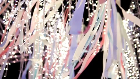 4K Backdrop Of Pastel Streamers And Ribbons With Integrated String Lights Stock Footage 334453105