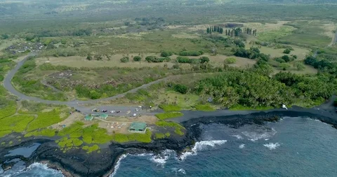 4k backwards tracking aerial view of Punaluʻu Beach,Big Island,Hawaii,usa Stock Footage 120766422