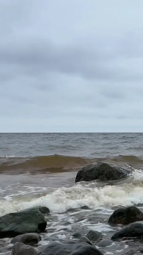 4K Baltic Sea Wave Splashing Against Large Rock with Real Natural Sound Stock Footage 321650448