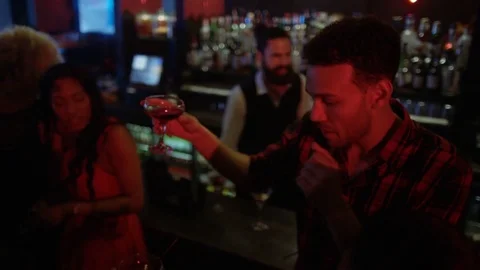 4K Bar Staff Working &amp; Young Party Crowd Dancing In Nightclub Video stock 75651790