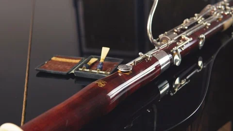 [4K] Bassoon laying on Grand Piano | Camera Slider Detail-Shot along Instrument Stock Footage