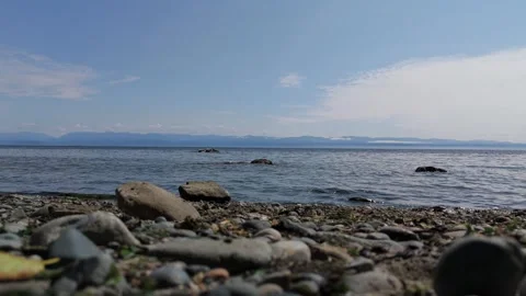 4K Beach Close-Up Waves on Rocks Mountain Background - Vancouver Island, Canada Stock Footage 321117513