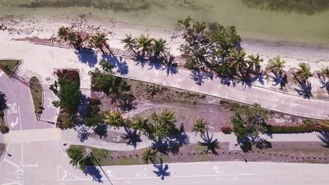 4k Beach fly over, afternoon, sunny, virginia key, miami 스톡 동영상 82805045