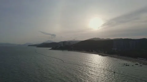 4K Beach White Clouds Sunset Stock Footage 235555608