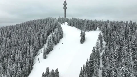 4K Beautiful aerial view of winter Rhodope Mountains and Pamporovo ski resort Stock Footage 178953645