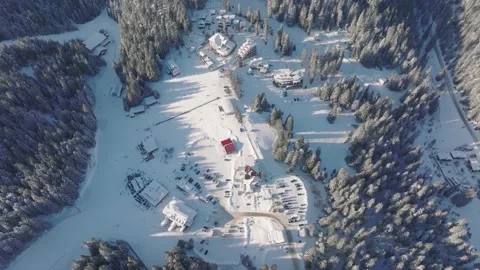 4K Beautiful aerial view of winter Rhodope Mountains and Pamporovo ski resort Stock Footage 196616166