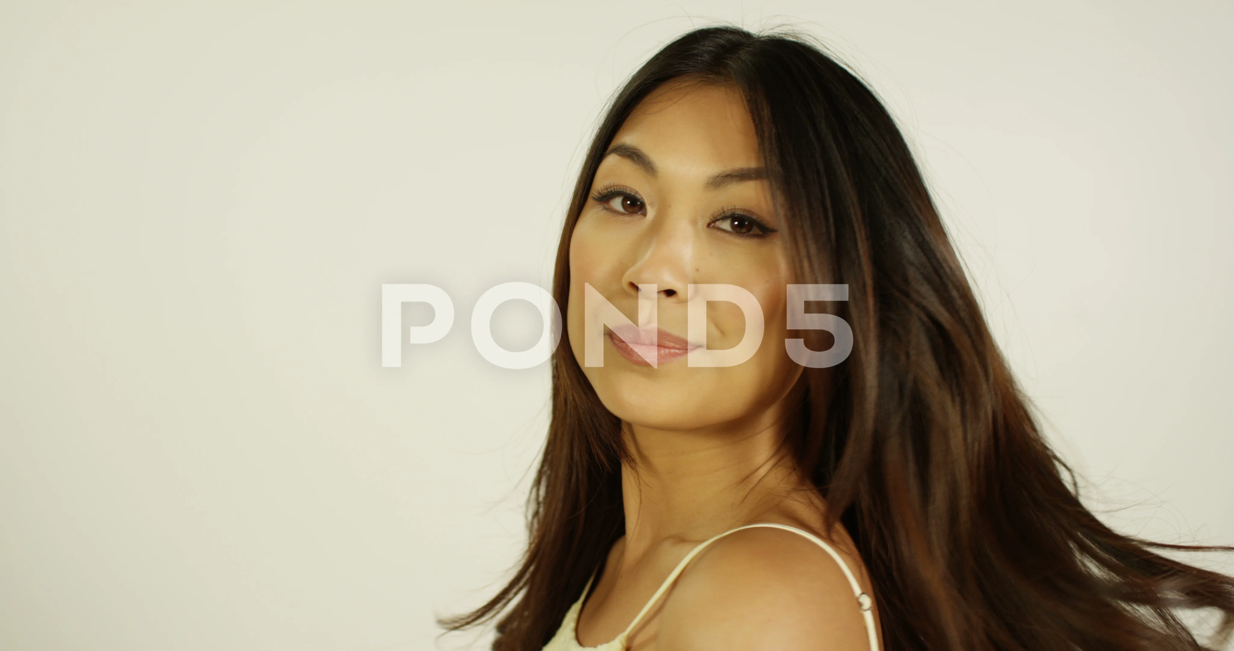 4K Beautiful Asian model posing in studio photoshoot with camera flash