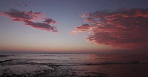 4K beautiful clouds over the ocean at sunset Stock Footage 64698151