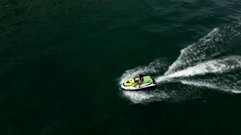 4K The beautiful lady fast run on jet ski Video stock 134667556