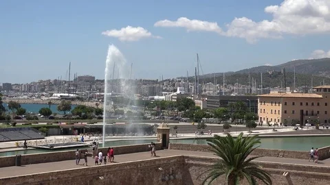 4K Beautiful Palma Majorca busy port traffic car and boat cruise anchor city day Stock Footage