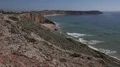 4k Beautiful rough coastline cliffs and ocean beach panning at Sagres Portugal 4k or 4k+ Resolution