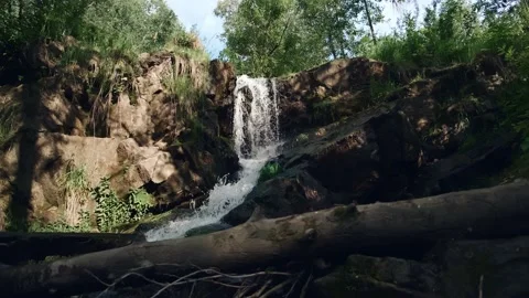 4K Beautiful small waterfall in the forest. 動画素材 134175642