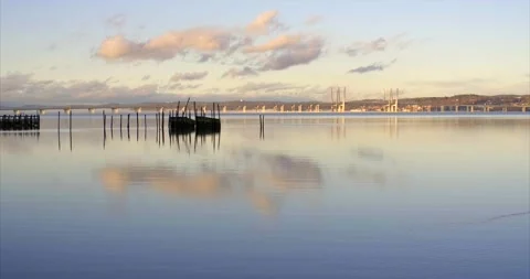4K Beautiful Sunset Sky reflected on calm water, Piermont, NY Stock Footage 150343933