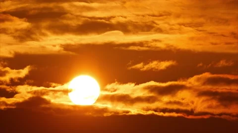 4K. Beautiful sunset sun moving across o... | Stock Video | Pond5