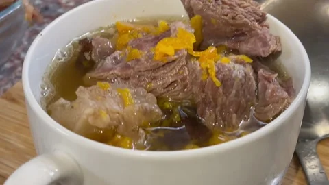 4K beef short ribs soup Stock Footage 227347327