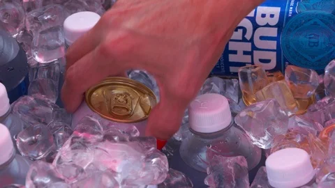 4K Beer Removed From Ice SlowMo Stock Footage 93161998
