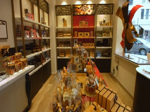 4K Belgian chocolates shop Stock Footage 80619571