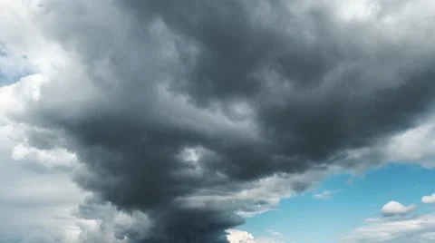 4k - Big storm clouds coming on blue sky timelapse in 4k Stock Footage 53230575