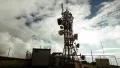 4K big tall communication tower with blue sky and clouds background timelapse 4k or 4k+ Resolution