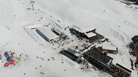 4k bird view ski resort in winter, base of skiers Stock Footage 112186450
