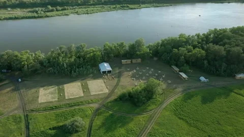 4K. Bird's-eye view of the river and the small town Stock Footage 204741952