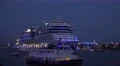 4k Blue illuminated AIDA Stella leave Hamburg harbour with sound 4k or 4k+ Resolution