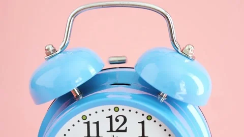 4K Blue Metal Double Bell Alarm Clock Mechanical Movement Night Light Stock Footage 339267767