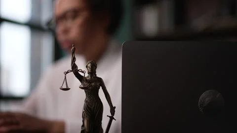 4k Blur view of young female lawyer talking and working at desk in modern office Stock Footage