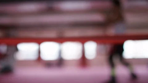 4K Blurred background of lone boxer training by himself in the boxing ring Vidéo 73135058