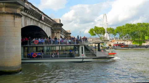 4K Boat Appears from Under Bridge, Seine River Boat, Boat Cruise in Paris Video stock 68690610