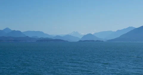 4K - On boat with far mountains Stock Footage 52373148