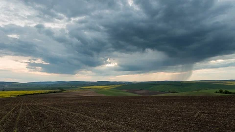 4K Bohemian Tuscany spring fields and rain washing them Stock Footage 119117131