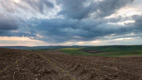 4K Bohemian Tuscany spring fields and dramatic clouds Stock Footage 119117453