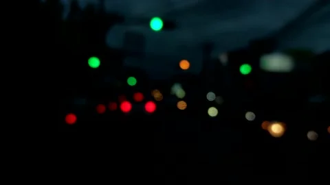 4K Bokeh of car lights, moving lights from a road of traffic at night time Stockbeeldmateriaal 196985151