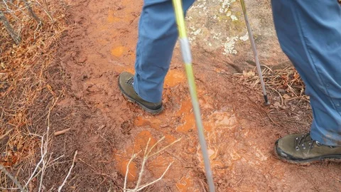 4K - Boots Walking Through Muddy Trail while Hiking in Colorado Stock Footage 105327277