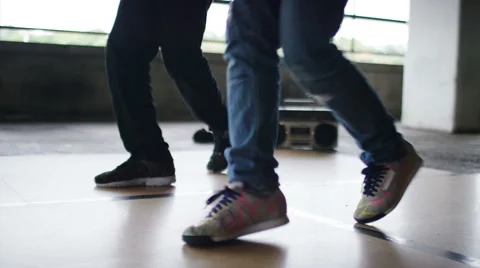 4K Breakdancers dance in sync, in slow motion, shot on RED EPIC DRAGON Stock Footage 54689464