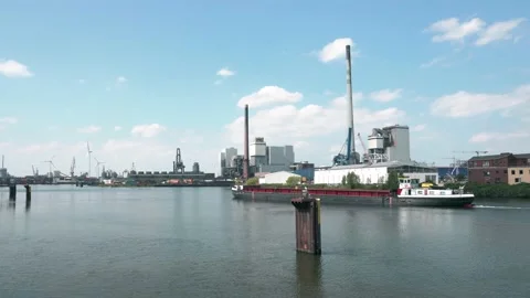 4k, Bremen, Germany - Cargo ship cruising in Industrial Harbor Video stock 194662142
