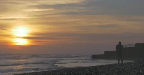 4K | Brighton Beach at Sunset/Magic Hour Stock Footage 47715746